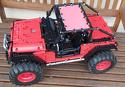 Jeep Wrangler Trailcat in Rot und mit S-Brick